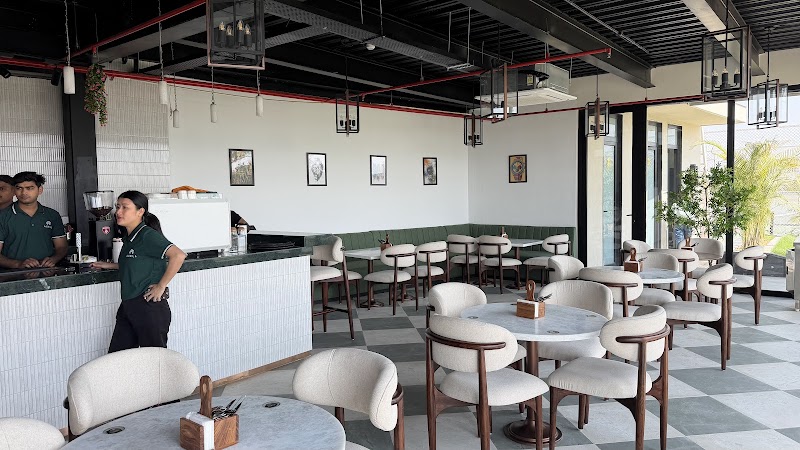 Axell Skydeck Rooftop Café & Pickleball Club / Sultanpur Place mentioned in saved reels