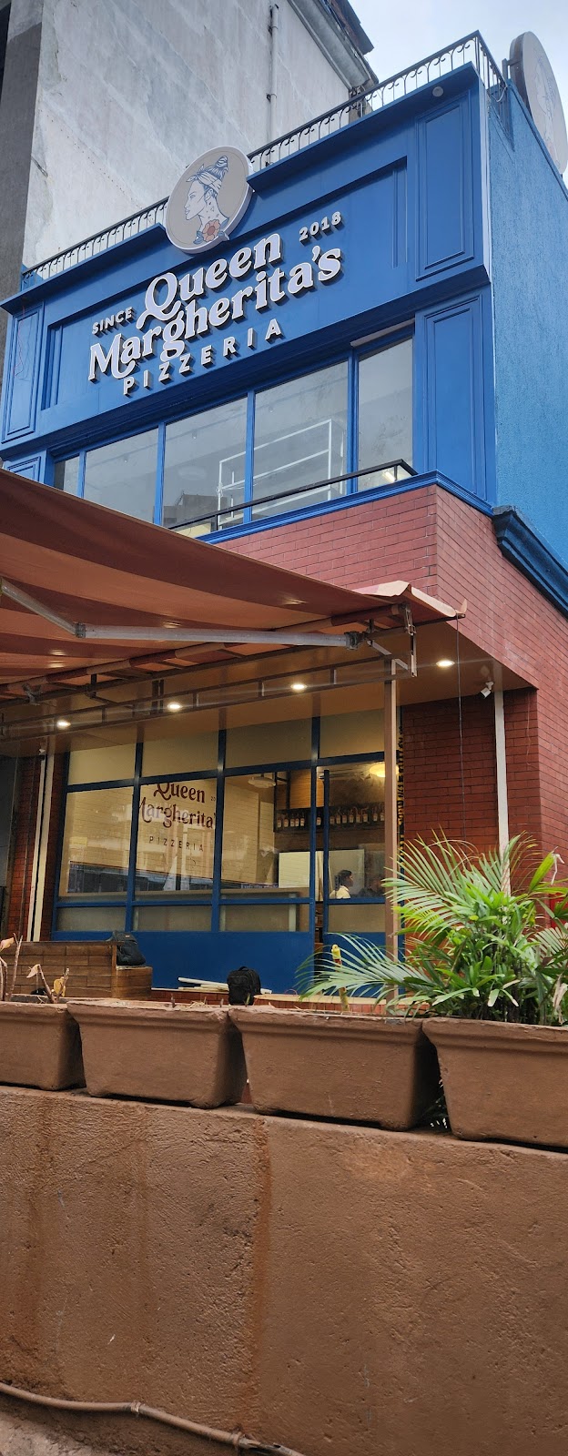 Queen Margherita's Pizzeria / Malad Place mentioned in saved reels